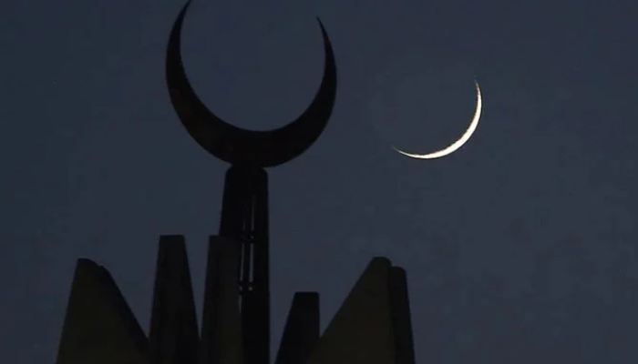 New crescent is seen in the sky in the background of a mosques minaret in this undated image. — AFP/File