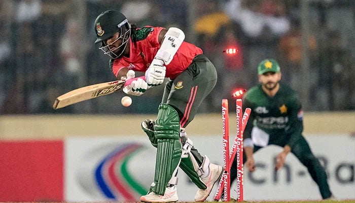 Bangladeshs Jaker Ali is clean bowled by Pakistans Salman Mirza during the third and final Twenty20 international cricket match between Bangladesh and Pakistan at the Sher-e-Bangla National Cricket Stadium in Dhaka on July 24, 2025. — AFP