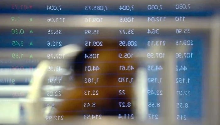 Broker is busy in trading at Pakistan Stock Exchange (PSX) in Karachi on Wednesday, June 4, 2025. — PPI