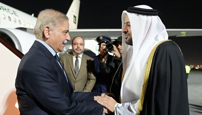 Prime Minister Shehbaz Sharif is being received by Minister of State for Foreign Affairs of Republic of Qatar, Dr Muhammad bin Abdulaziz Al-Khulaifi at King Hammad International Airport on February 23, 2026. — PID