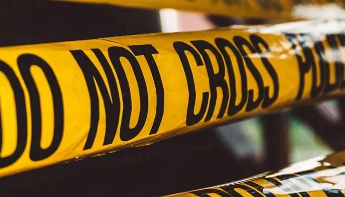 The picture shows a police tape at an incident site. — AFP/File