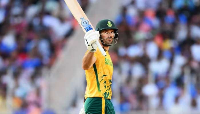 Aiden Markram of South Africa celebrates getting his half century during the ICC Mens T20 World Cup 2026 Super 8 match against West Indies at Narendra Modi Stadium on February 26, 2026 in Ahmedabad, India. — ICC