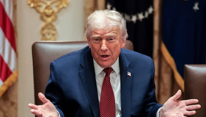 US President Donald Trump gestures as he attends a roundtable discussion on the day he announced an aid package for farmers, at the White House in Washington, DC on December 8, 2025. — Reuters