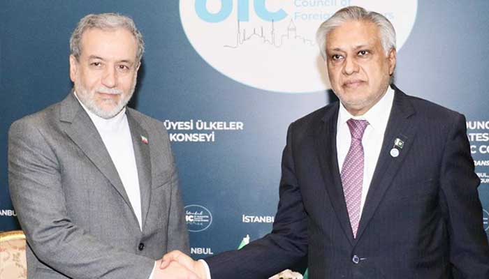 Deputy Prime Minister and Foreign Minister Senator Ishaq Dar and Irans FM Seyed Abbas Araghchi meet on the sidelines of the 51st OIC CFM in Istanbul. — Ministry of Foreign Affairs/File