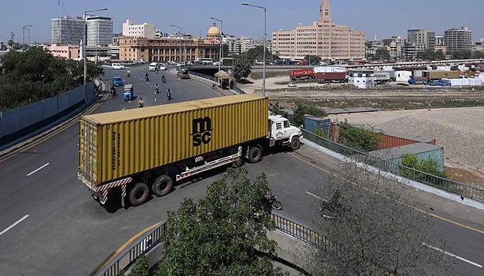 A container placed on a road leading to the US Consulate in Karachi on March 2, 2026. — INP