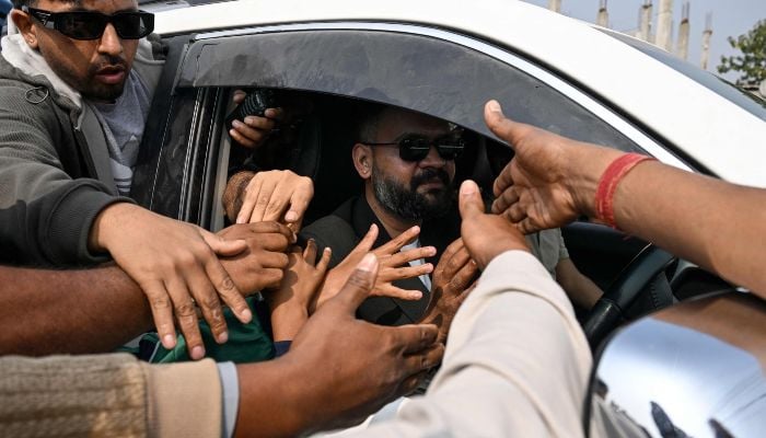 Rastriya Swatantra Party (RSP) election candidate Balendra Shah (C) is greeted by supporters during a rally on the final day of campaigning ahead of Nepals general election at Gauriganj in Jhapa district on March 2, 2026. — AFP