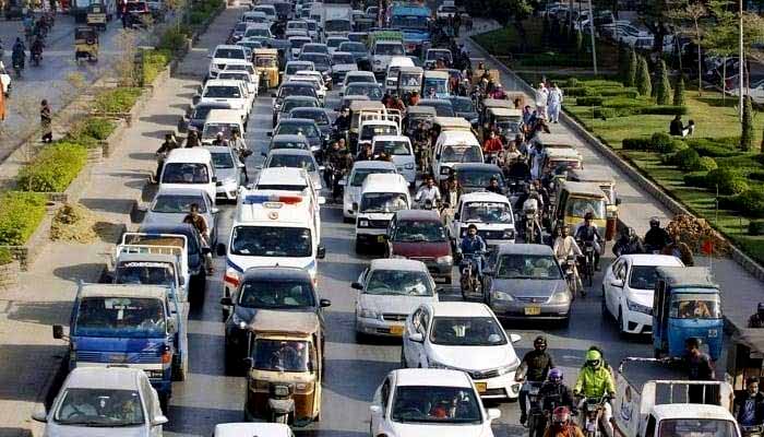 Large numbers of vehicles are seen stuck in a traffic jam in Karachi. — PPI/File