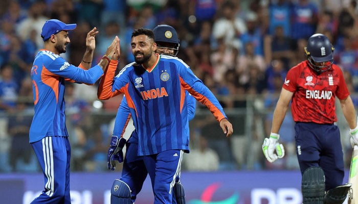 Indias Varun Chakravarthy celebrates after taking the wicket of Englands Jos Buttler during ICC Mens T20 World Cup 2026 semi-final on March 5, 2026. — Reuters
