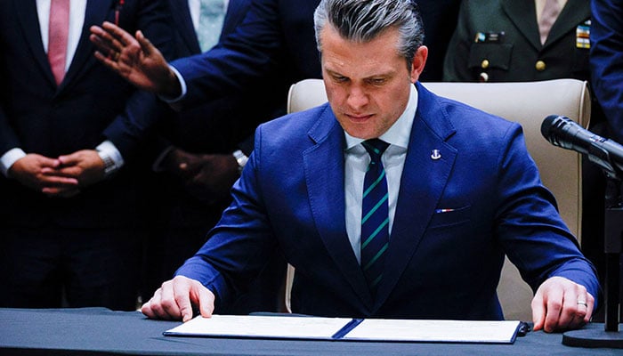 US Secretary of Defense Pete Hegseth looks at the signed joint security agreement at the inaugural Americas Counter Cartel Conference with regional defense and security leaders at US Southern Command headquarters in Doral, Florida, US, March 5, 2026. — Reuters