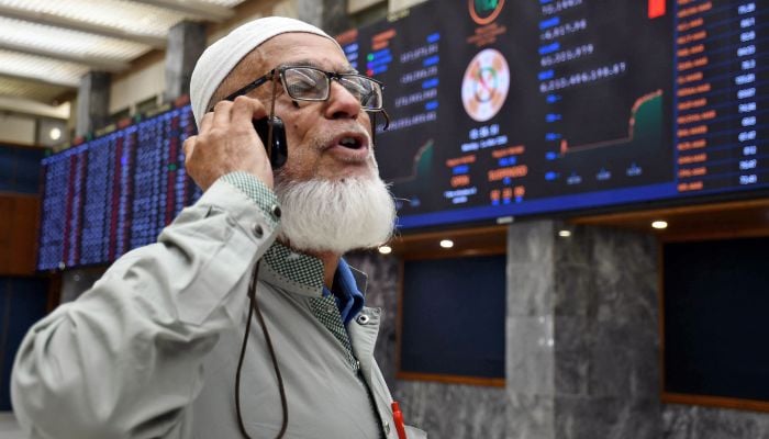 A trader monitors stock prices at the Pakistan Stock Exchange (PSX) in Karachi, March 2, 2026. — Online