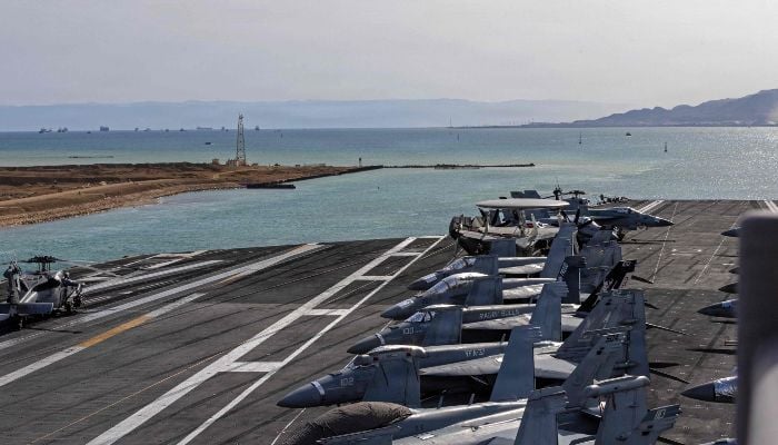 This US Navy handout photo released by US Central Command Public Affairs shows the aircraft carrier, USS Gerald R Ford (CVN 78), transiting the Suez Canal, on March 5, 2026. — AFP