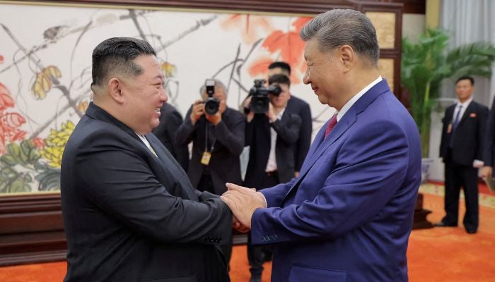 North Korean leader Kim Jong Un and Chinese President Xi Jinping shake hands on the day of their bilateral summit in Beijing, China, September 4, 2025, in this picture released by North Koreas official Korean Central News Agency. — Reuters