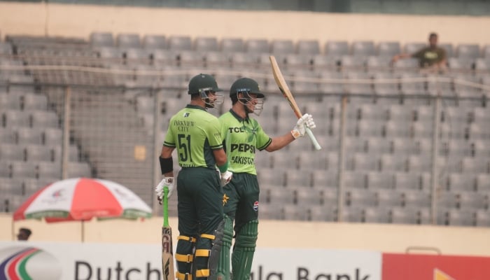 Pakistans Maaz Sadaqat (right) celebrates his fifty during the second ODI against Bangladesh at Sher-e-Bangla National Cricket Stadium, Dhaka, March 13, 2026. — X/@TheRealPCB