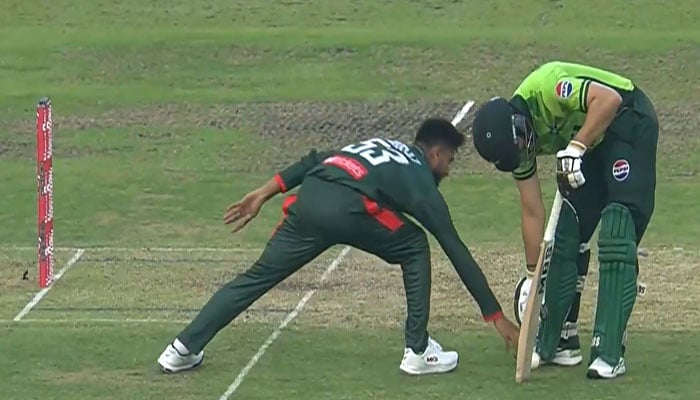 Bangladesh skipper Mehidy Hasan Miraz (left) attempts to run out while Salman Agha stands outside the crease during the second ODI match against Pakistan here at the Sher-e-Bangla National Cricket Stadium in Dhaka on March 12, 2026. — Screengrab/X/@BCBtigers