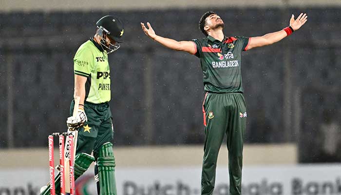Bangladeshs Taskin Ahmed (R) reacts after the dismissal of Pakistans Salman Agha (L) during the third one-day international (ODI) cricket match between Bangladesh and Pakistan at Sher-e-Bangla National Stadium in Mirpur on March 15, 2026. — AFP