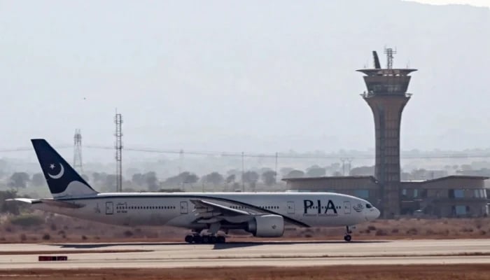 A PIA aircraft prepares to take off at the Islamabad International Airport. — AFP/File