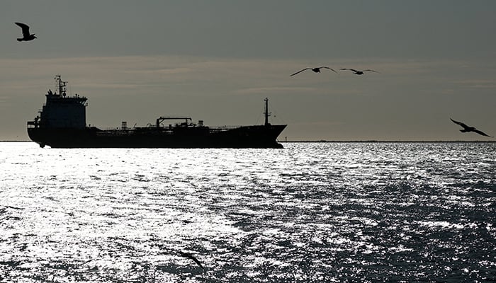 The silhouette of the oil and chemical tanker Habip Bayrak sails off the Gulf of Fos-sur-Mer, in Port-de-Bouc, France, March 12, 2026. — Reuters