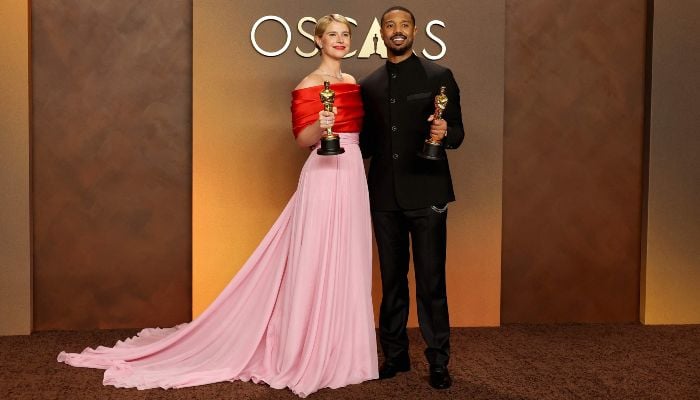 Jessie Buckley, winner of the Best Actress Award for Hamnet and Michael B Jordan, winner of the Best Actor Award for Sinners, pose in the press room during the 98th Oscars at Dolby Theatre on March 15, 2026, in Hollywood, California, US. — AFP