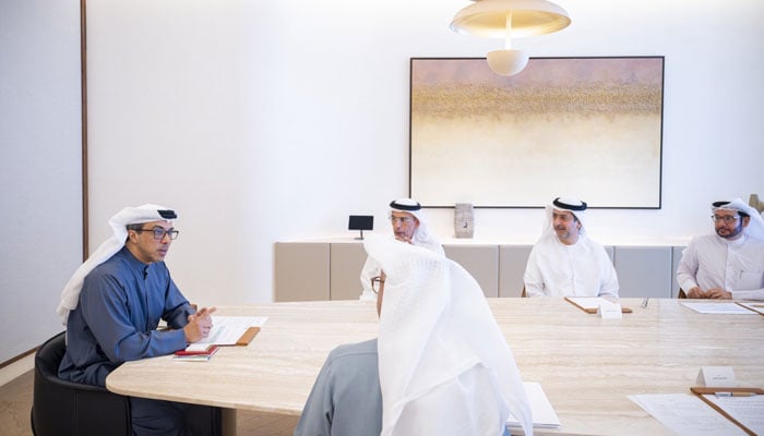 This image shows His Highness Sheikh Mansour bin Zayed Al Nahyan, the Vice President, Deputy Prime Minister, and Chairman of the Presidential Court of the UAE, chairing a meeting. — X@HHmansour