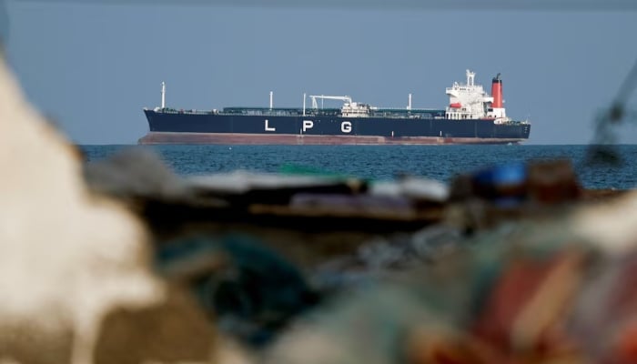 An LPG gas tanker at anchor as traffic is down in the Strait of Hormuz, amid the U.S.-Israeli conflict with Iran, in Shinas, Oman, March 11, 2026. — Reuters