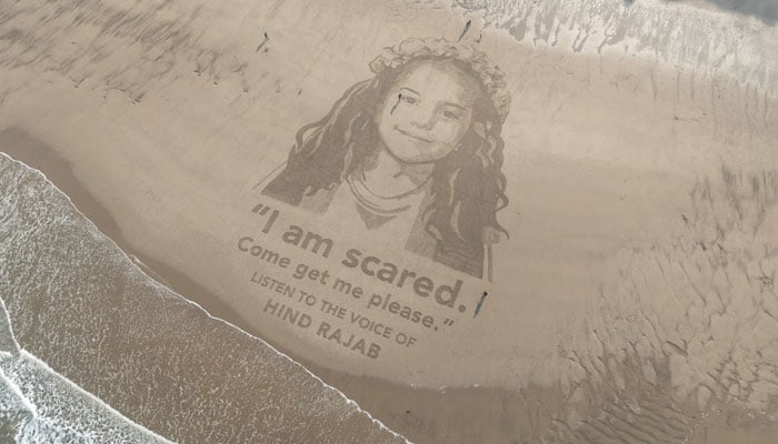 Drone view of a giant sand portrait of Hind Rajab, a 5-year-old Palestinian girl killed in Gaza in 2024 and the focus of the Oscar-nominated film The Voice of Hind Rajab, created on a beach near Scarborough, North Yorkshire, Britain, in this undated handout image. — Reuters