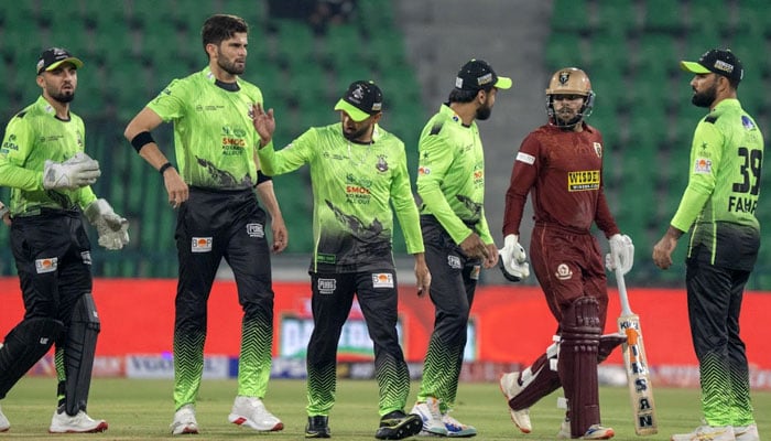 Lahore Qalandars players celebrate after claiming a wicket during the Pakistan Super League 11 match against Hyderabad Kingsmen at Gaddafi Stadium, Lahore, on March 26, 2026. — PSL