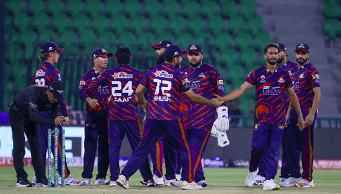 Karachi Kings Hasan Ali (third from right) celebrates taking a wicket with teammates during their PSL 11 match against Quetta Gladiators at the Gaddafi Stadium in Lahore on March 27, 2026. — PSL