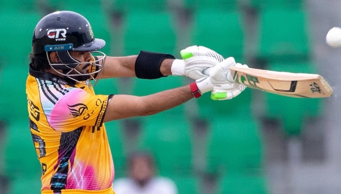 Peshawar Zalmi captain Babar Azam plays a shot during their Pakistan Super League (PSL) 11 match against Rawalpindiz at the Gaddafi Stadium on Saturday. — X/@PeshawarZalmi