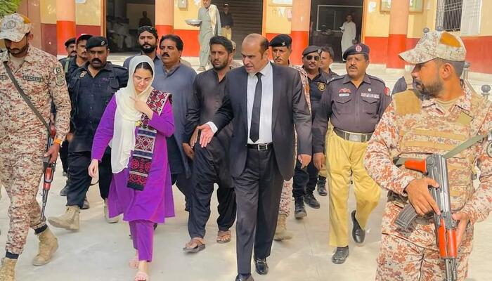 An undated image of complainant Umme Rubab Chandio exiting a court. — X@UmeRubabChandio