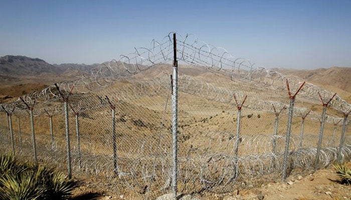 A view of the border fence outside the Kitton outpost on the border with Afghanistan in North Waziristan, Pakistan October 18, 2017. — Reuters