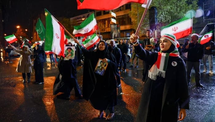 Protesters attend an anti-US and anti-Israeli rally, amid the U.S.-Israeli conflict with Iran, in Tehran, Iran, March 26, 2026. — Reuters