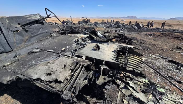 An image released on April 5, 2026, and obtained from social media appears to show wreckage of an American aircraft and a helicopter rotor in Isfahan, Iran. — Reuters
