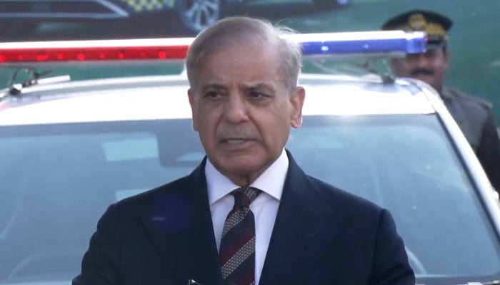 PM Shehbaz addresses a ceremony in Islamabad for the provision of eco-smart EVs to the Capital Traffic Police. — X/@GovtofPakistan