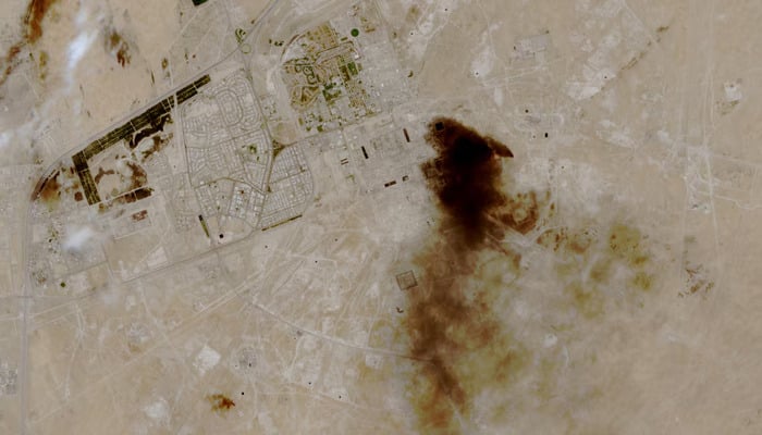 A satellite view of smoke billowing at a Saudi Aramco oil facility after a reported attack, following the announcement of a two-week ceasefire in the Iran war, in Abqaiq, Saudi Arabia April 8, 2026.— Reuters