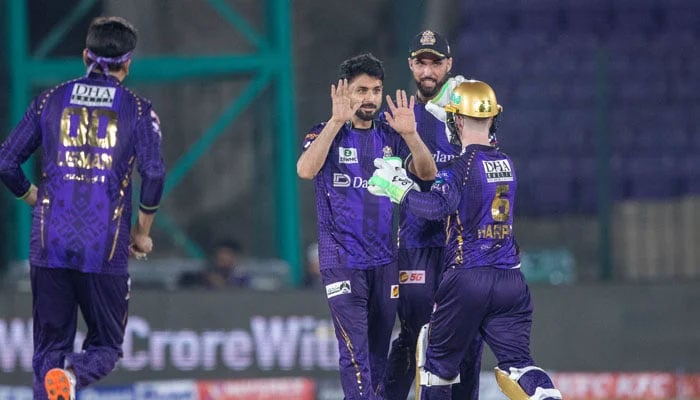 Quetta Gladiators Abrar Ahmed (second from left) celebrates after taking a wicket with teammates during their PSL 11 match against Rawalpindiz at the National Bank Stadium in Karachi on April 10, 2026. — PSL