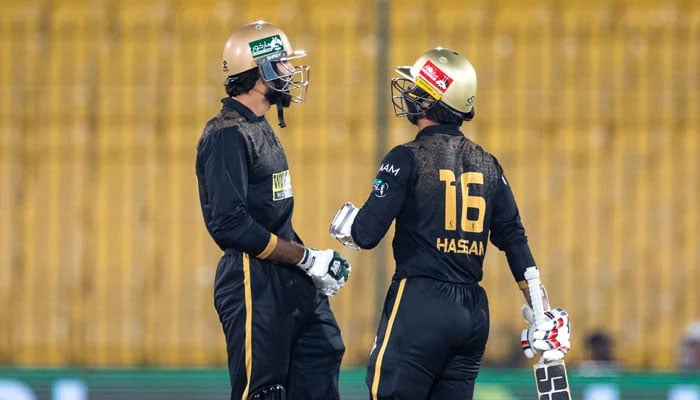 Hyderabad Kingsmens Muhammad Irfan Khan (left) and Hassan Khan bump fists during their PSL 11 match against Karachi Kings at the National Bank Stadium in Karachi on April 11, 2026. — PSL