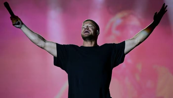 US singer Dan Reynolds of Imagine Dragons performs on the main stage of the Rock in Rio music festival at the Rio 2016 Olympic Park in Rio de Janeiro, Brazil, on September 14, 2024. — AFP
