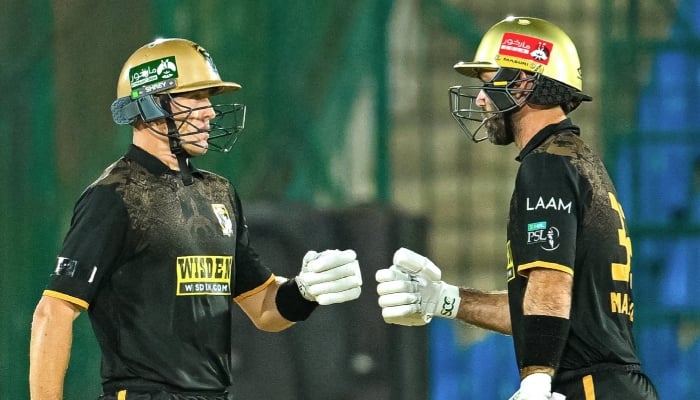 Hyderabad Kingsmen captain Marnus Labuschagne (left) Glenn Maxwell bump fists during their PSL 11 match against Islamabad United at the National Bank Stadium, Karachi, April 12, 2026. — X/@HHKingsmen