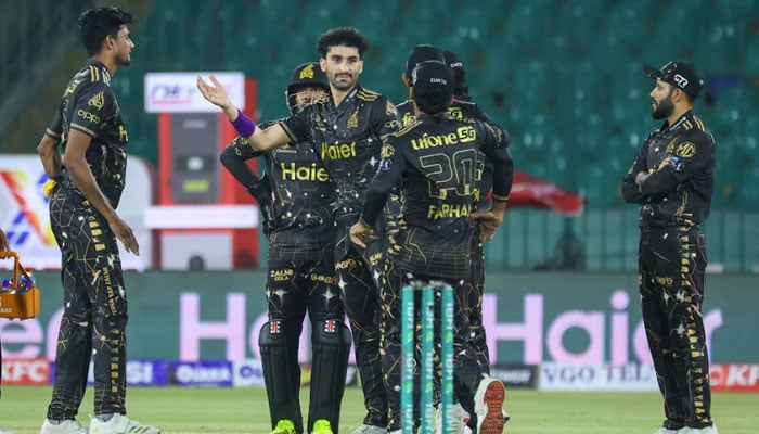 Peshawar Zalmis Sufiyan Muqeem (centre) celebrates with teammates after claiming a wicket during the PSL 11 match against Multan Sultans at the National Bank Stadium in Karachi on April 13, 2026. — PSL