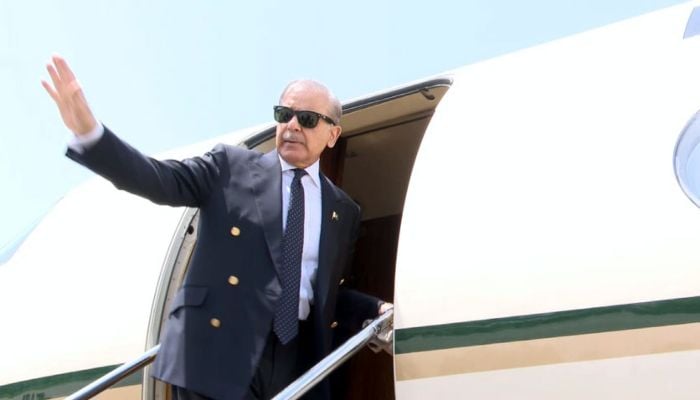 Prime Minister Shehbaz Sharif gestures as he departs on a visit. — Radio Pakistan