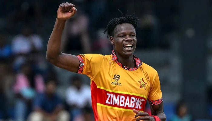 Zimbabwes Blessing Muzarabani celebrates taking a wicket during their ICC Mens T20 World Cup match against Australia at the R Premadasa Stadium in Colombo on February 13, 2026. — AFP