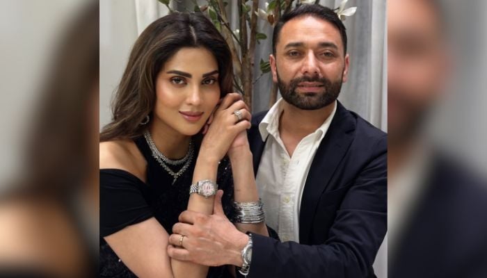 Morning show host Fiza Ali poses with husband Ejaz Khan in an undated picture. — Instagram/@fizaali