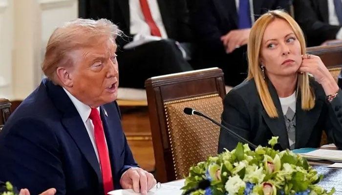US President Donald Trump speaks next to Italian Prime Minister Giorgia Meloni during a meeting at the White House in Washington, DC, August 18, 2025. — Reuters