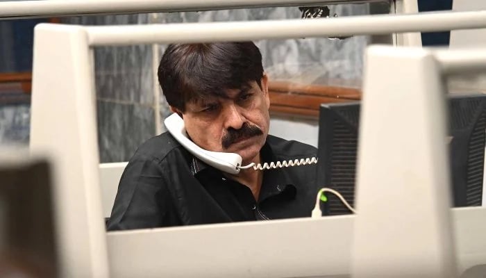 A trader monitors share prices at Pakistan Stock Exchange (PSX) in Karachi, April 8, 2026. — INP