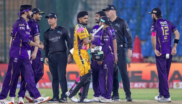 Peshawar Zalmi’s Babar Azam walks back after winning the PSL match against Quetta Gladiators at the National Bank Stadium in Karachi on April 15, 2026. — PSL