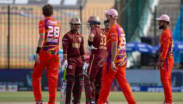 Hyderabad Kingsmens Saim Ayub (second from left) and Marnus Labuschagne (centre) interact during the PSL 11 match against Rawalpindiz at National Bank Stadium, Karachi, on April 16, 2026. — PSL