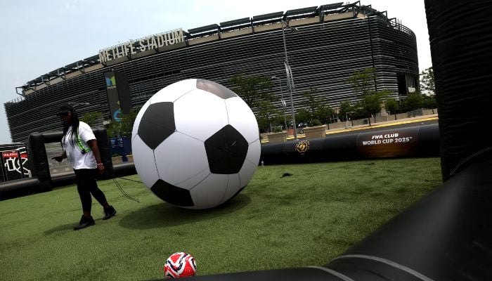 General view of a member of staff with a giant ball on a pitch outside the stadium ahead of the Club World Cup, MetLife Stadium, East Rutherford, New Jersey, US, June 13, 2025. — Reuters