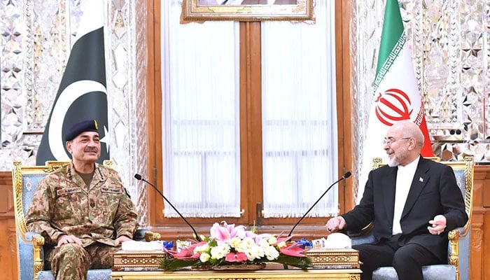 Chief of Defence Forces and Chief of Army Staff Field Marshal Asim Munir meets Irans Parliament Speaker Mohammad Bagher Ghalibaf in Tehran, during his three-day visit to Iran, April 18, 2026. — ISPR