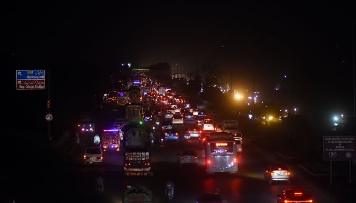 Commuters on their way at Islamabad expressway during a power cut, Islamabad, April 16, 2026. — Online