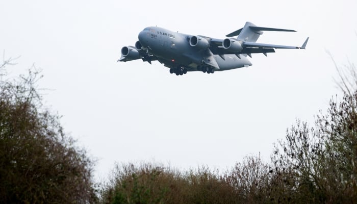 US Air Force C-17 Globemaster III lands at RAF Fairford airbase in Fairford, Gloucestershire, Britain, March 23, 2026. — Reuters